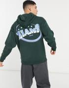 Asos Design Oversized Hoodie In Dark Green With Miami City Prints