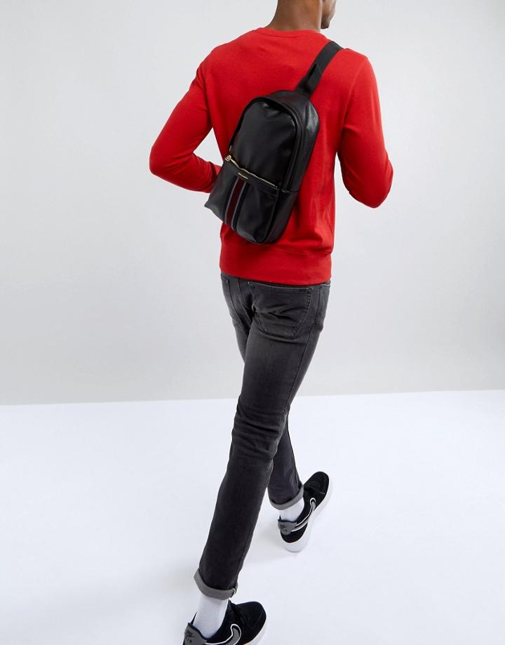 Asos Design Cross Body Backpack In Black Faux Leather With Front Pocket Stripe - Black