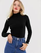 Mango Ribbed Roll Neck Long Sleeved Top In Black