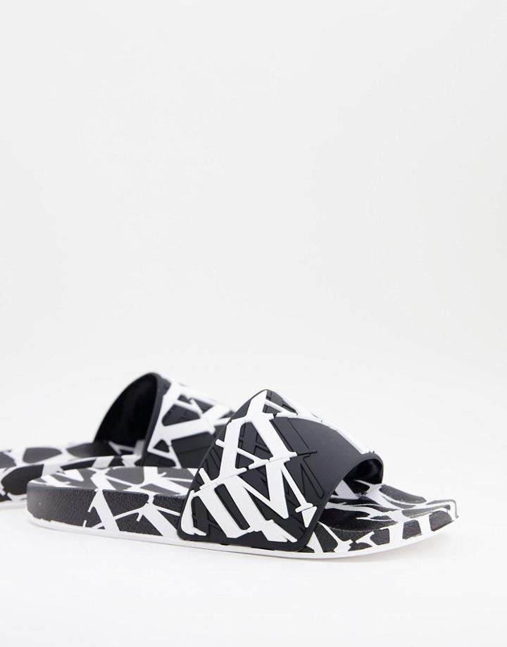 Asos Design Slides In Black With Monogram Print