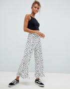 Asos Design Pants With Fluted Ruffle Hem In Polka Dot - White