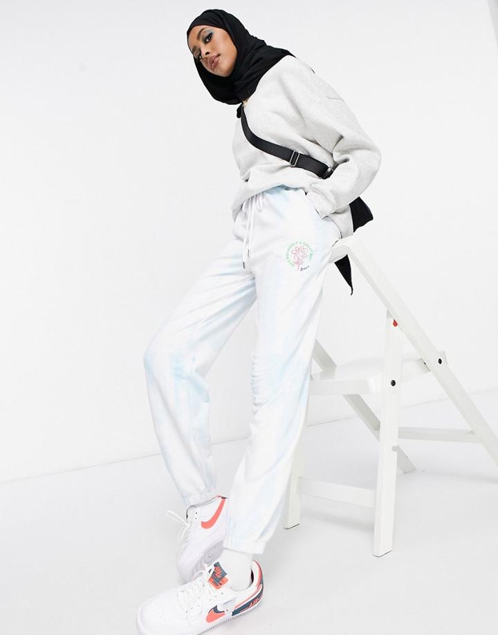 Asos Design Sweatpants With Tie Dye And Embroidery In Blue-blues