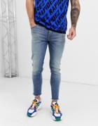 Asos Design Skinny Cropped Jeans In Vintage Mid Wash Blue With Raw Hem