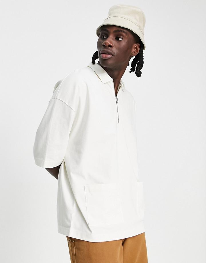 Asos Design Oversized Polo With Zip And Pocket Details In Cream-white