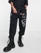Asos Daysocial Oversized Sweatpants With Multi Game Graphic Prints And Logo In Washed Black - Part Of A Set