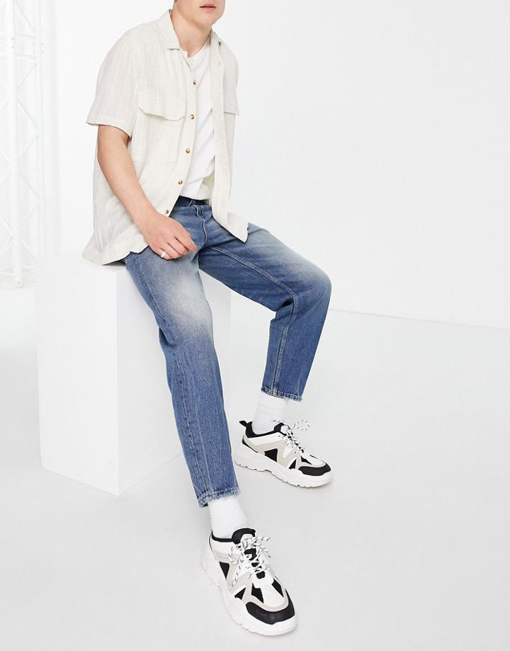 Asos Design Relaxed Tapered Jeans In Tinted Dark Wash-blues