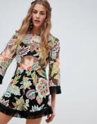 Love & Other Things Embroidered Mesh Tassle Romper - Black
