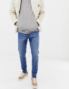 Brooklyn Supply Co Carrot Fit Raw Hem Jeans In Stonewash Blue - Blue