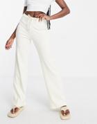 Asos Design Rib Pants With Puddle Hem In Yellow