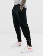 Asos Design Tapered Sweatpants In Black With Silver Zip Cuffs
