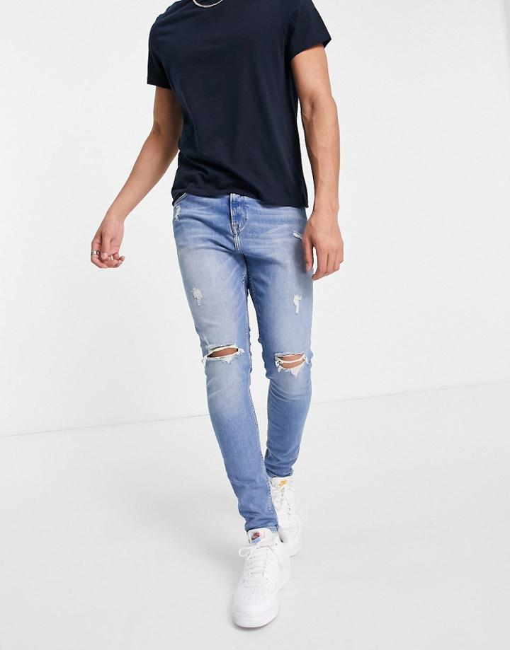 Jack & Jones Intelligence Pete Carrot Fit Jeans With Rips In Midwash Blue-blues