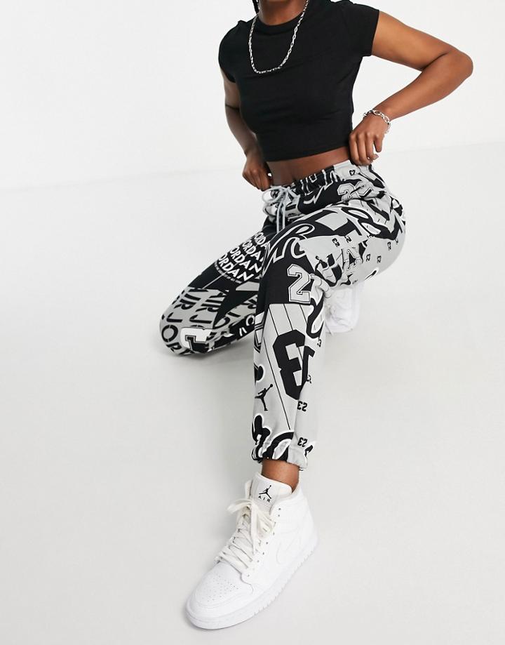 Nike Jordan Core Essentials All Over Print Cuffed Fleece Sweatpants In Gray Heather/black