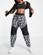Nike X Serena Designcrew Woven Geo Print Cuffed Pants In Black