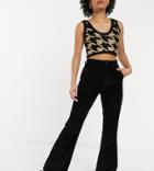 Reclaimed Vintage Inspired The '87 Flared Jean In Black Corduroy