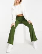 Asos Design Ribbed Kick Flare Pants In Khaki-green