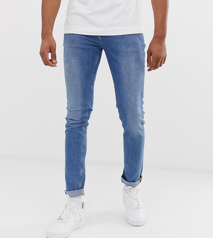 Asos Design Tall Skinny Jeans In Mid Wash Blue