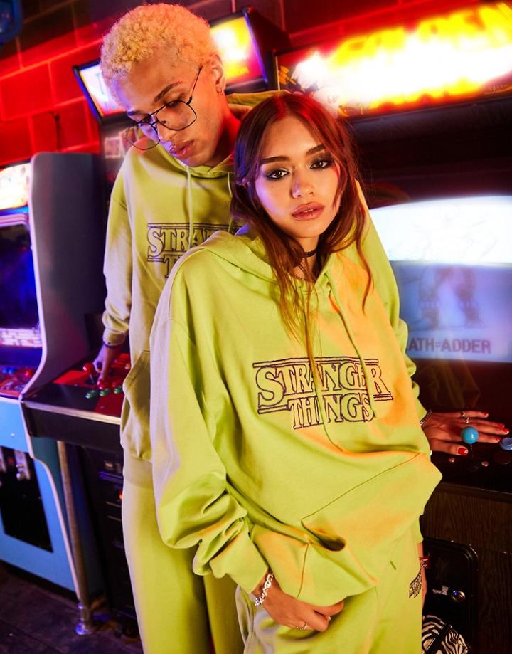 Reclaimed Vintage X Stranger Things Unisex Hoodie In Washed Yellow With Logo-multi