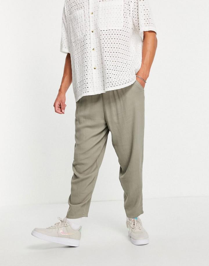 Asos Design Oversized Tapered Lightweight Pants With Elasticized Waist In Khaki-green