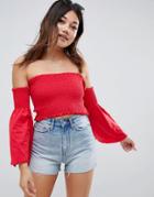 Asos Design Off Shoulder Shirred Crop Top With Flared Sleeve In Red - Red