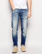 Wrangler Colton Tapered Jeans In San Sebastian - San Sebastian