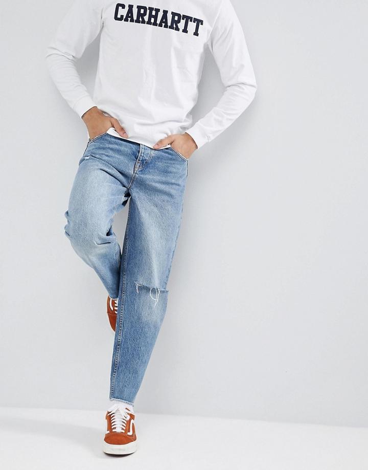 Asos Design Skater Jeans In Mid Wash Blue With Rips - Blue