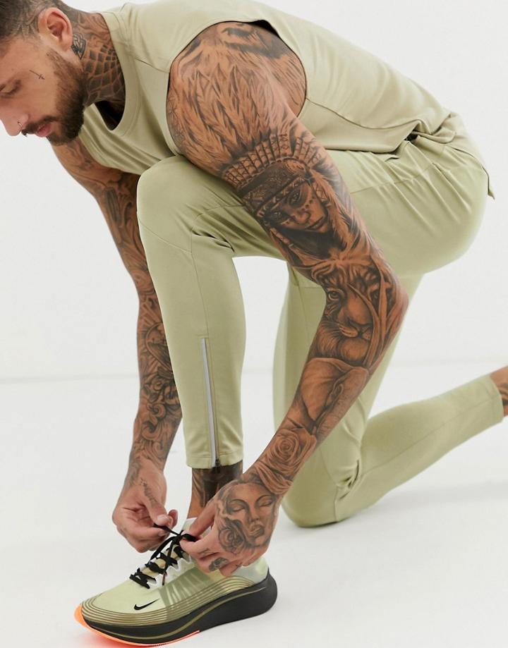 Asos Super Skinny Running Sweatpants With Reflective Zip Detail In Light Khaki - Beige
