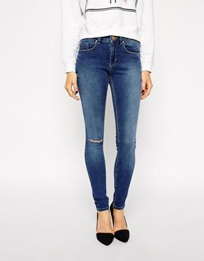 Asos Mid Rise Skinny Jeans In Mount Eden Mid Wash Blue With Ripped Knee - Mid Wash