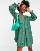 Asos Design Cotton Poplin V Front V Back Trapeze Mini Dress In All Over Floral Embroidery In Green
