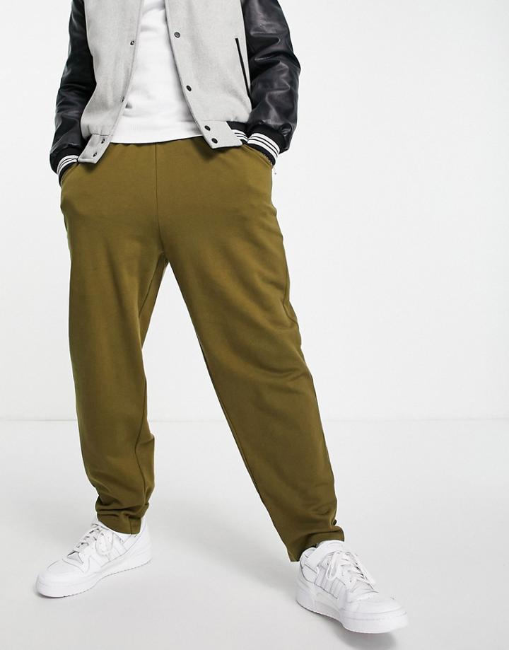 Asos Design Organic Oversized Sweatpants With Ankle Strap In Green