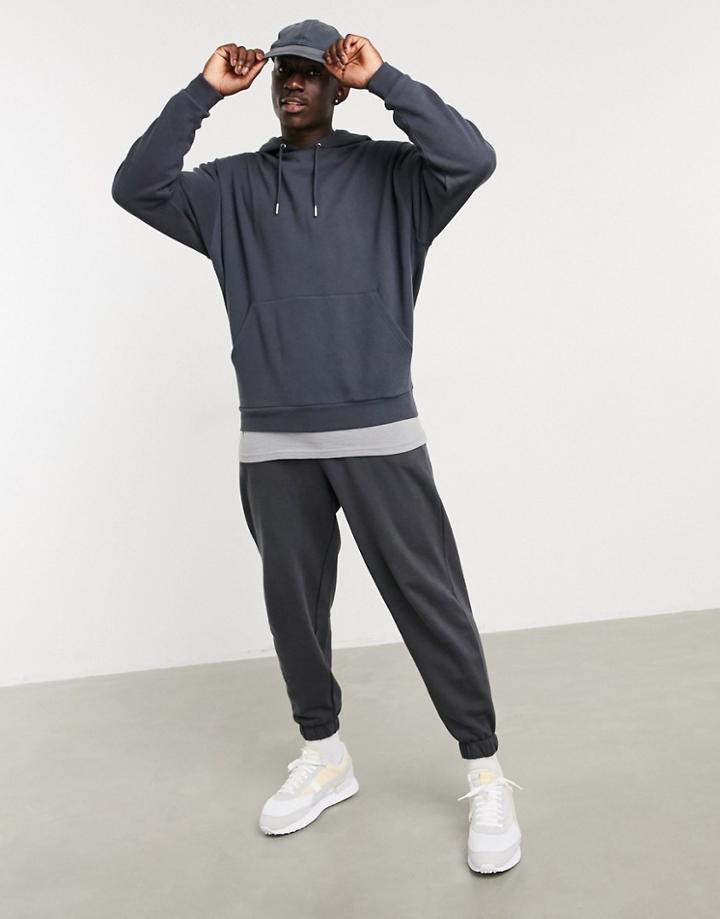 Asos Design Oversized Hoodie In Washed Black With Gray T-shirt Hem