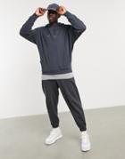 Asos Design Oversized Hoodie In Washed Black With Gray T-shirt Hem
