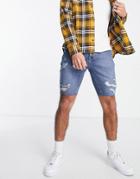Asos Design Skinny Denim Jeans In Mid Blue Wash With Raw Hem And Rips