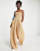 Asos Design Crinkle Rayon Strapless Slouch Jumpsuit In Orange Ditsy Print-multi