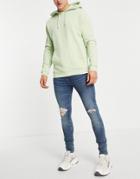 Asos Design Spray On Jeans With Powerstretch In Tinted Mid Wash With Knee Rips-blues