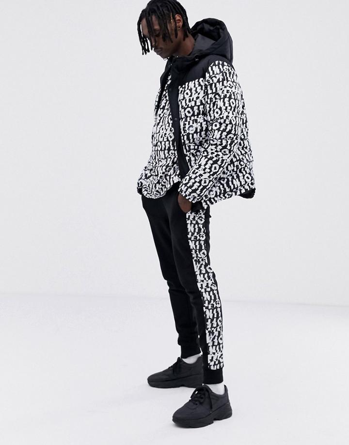 Asos Design Skinny Joggers With Text Print Side Stripe In Nylon Fabric - Black