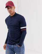 Asos Design Organic Long Sleeve Polo Shirt With Contrast Sleeve Stripe In Navy