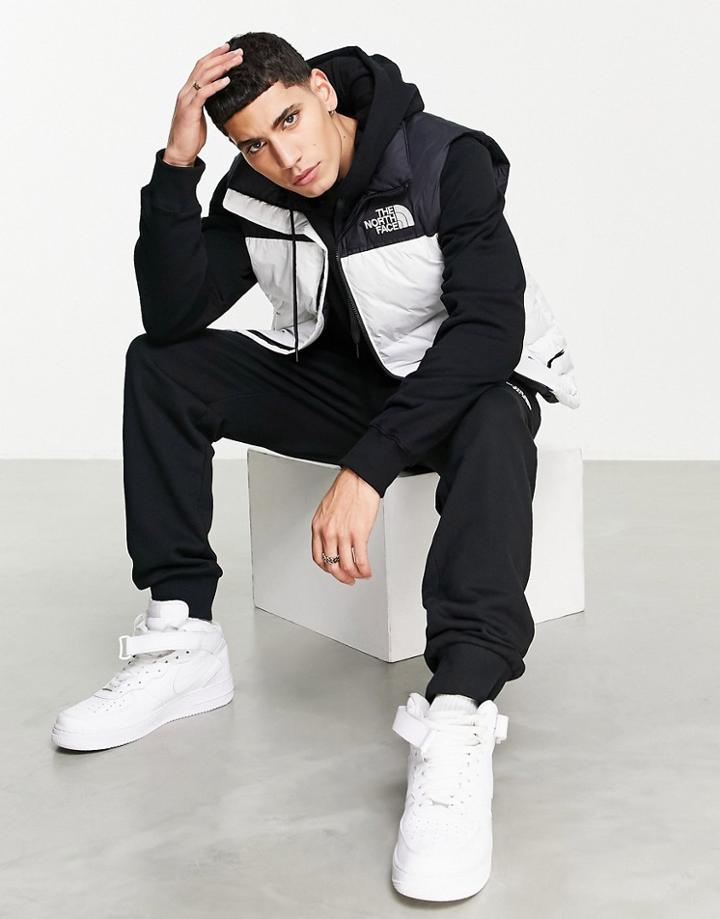 The North Face 1996 Retro Nutpse Hooded Vest In White