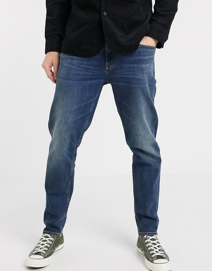 Asos Design Stretch Tapered Jeans In Vintage Dark Wash Blue-blues