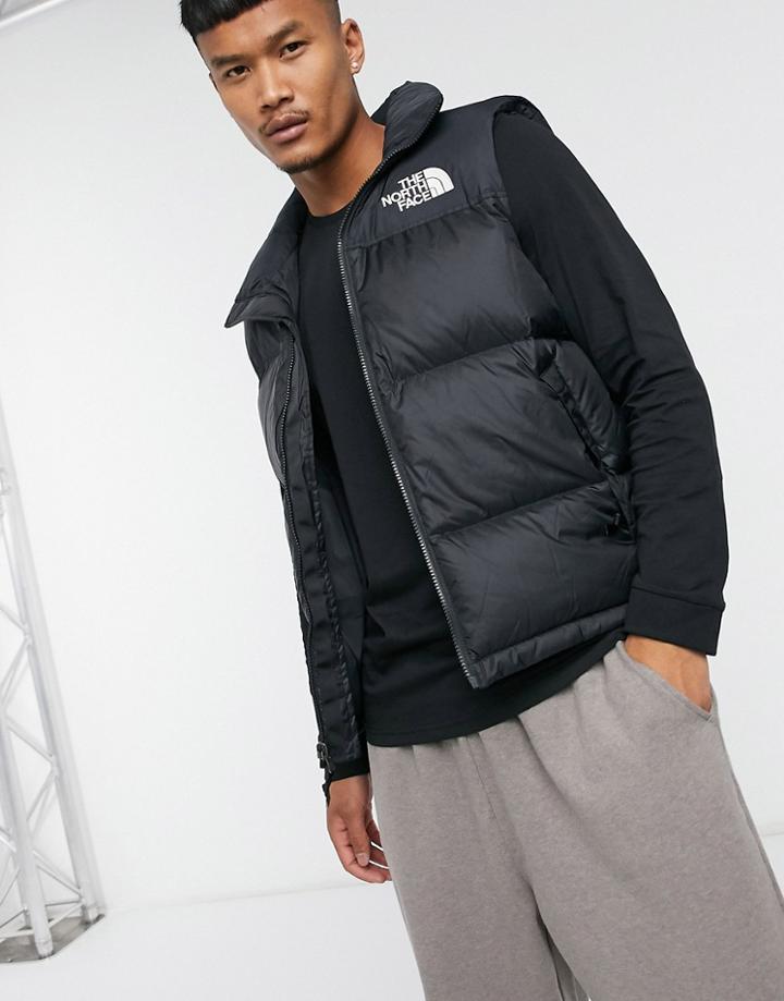 The North Face 1996 Retro Nutpse Hooded Vest In Black