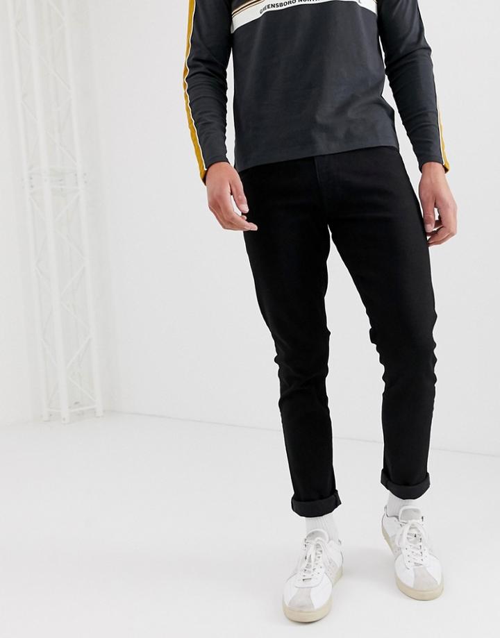 Wrangler Larston Slim Tapered Fit Jeans In Black Valley Rinse Wash