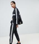Na-kd Two-piece Logo Track Pants In Black