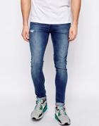 Asos Extreme Super Skinny Jeans With Rip And Repair - Blue