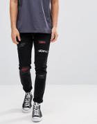 Asos Skinny Jeans In Black With Rips And Printed Patches - Black