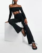 Night Addict Hip Strap Flare Pants In Black