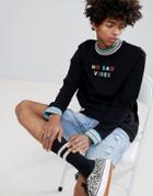 Asos Design Relaxed Long Sleeve T-shirt With Rainbow Contrast Rib And No Bad Vibes Print - Black