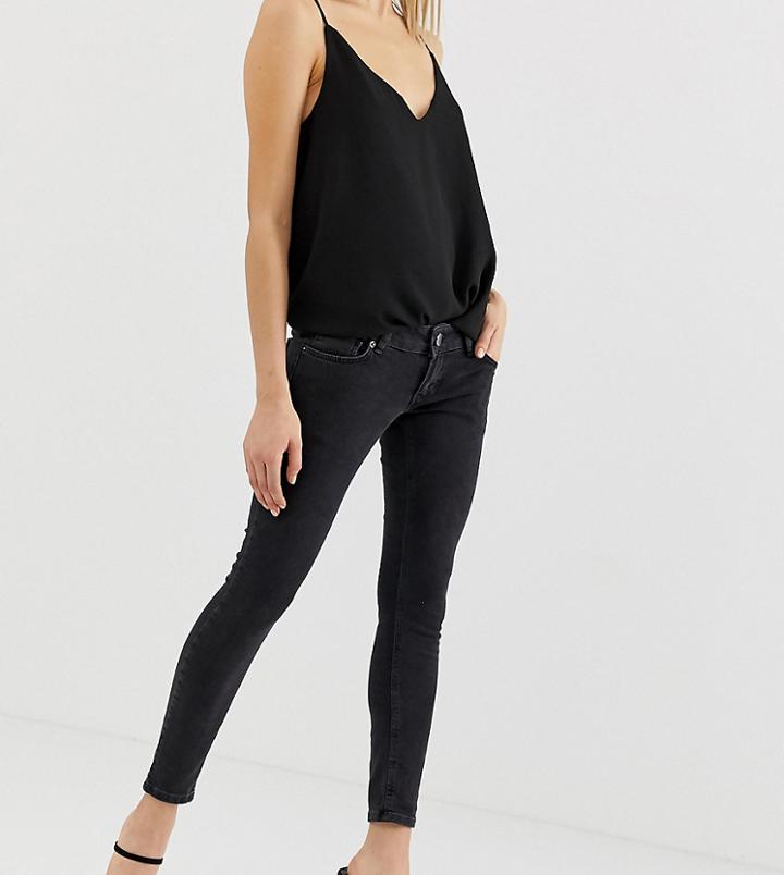 Asos Design Petite Extreme Low Rise Skinny Jeans In Washed Black