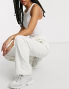 Damson Madder Straight Leg Relaxed Pants With Front Seam & Logo Detail In Recycled Poly Cotton-white
