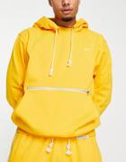 Nike Basketball Dri-fit Standard Issue Hoodie In Yellow