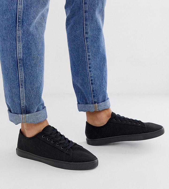 Asos Design Wide Fit Sneakers In Black Canvas