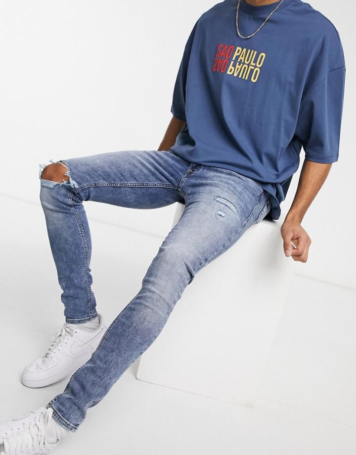 Jack & Jones Intelligence Tom Super Skinny Jeans With Ripped Knee In Blue-blues